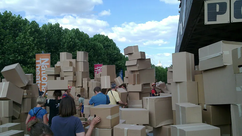 Cardboard parcels stacked in a China consolidation warehouse waiting to be combined