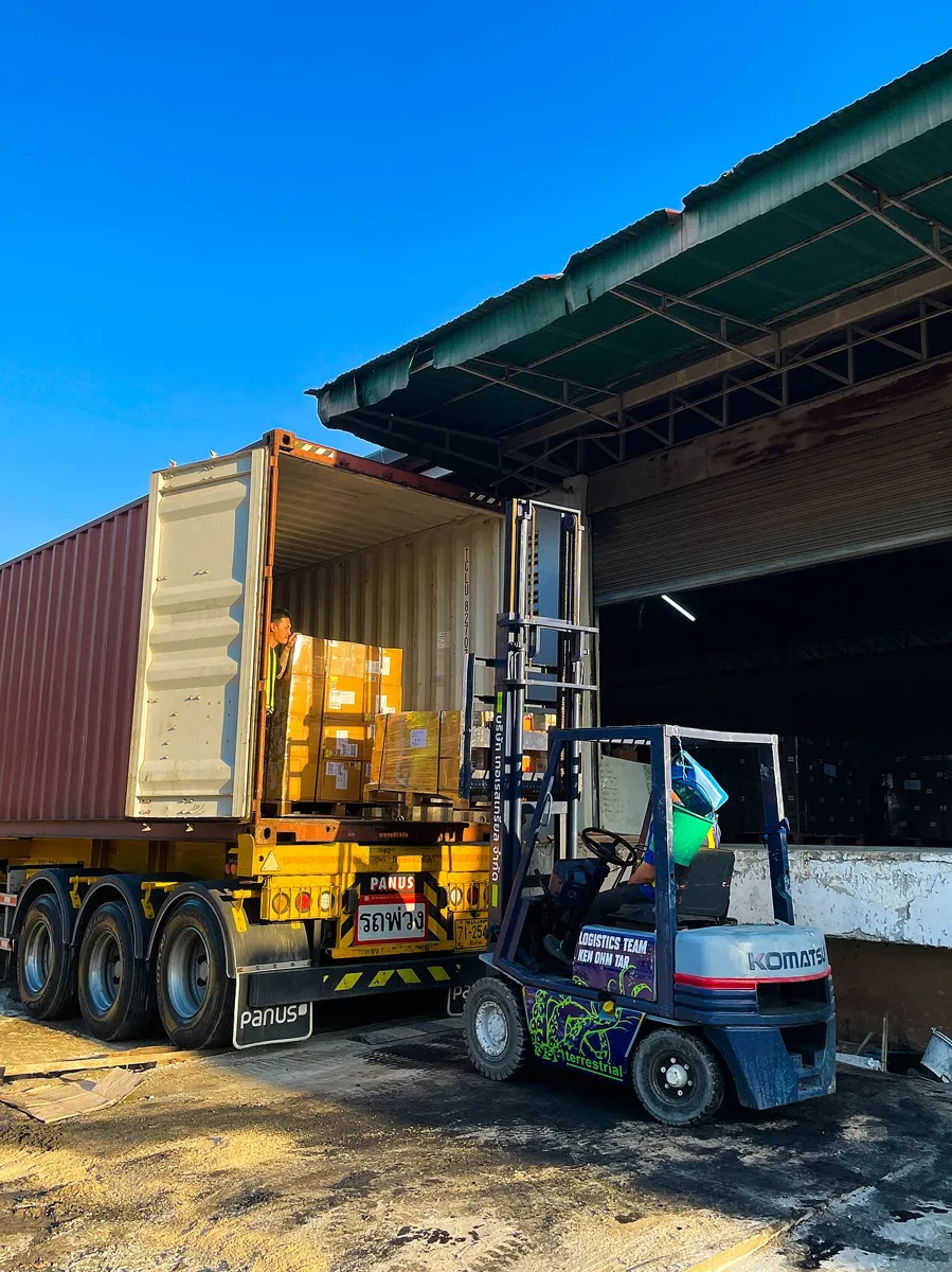 Forklift loading cargo at a freight warehouse