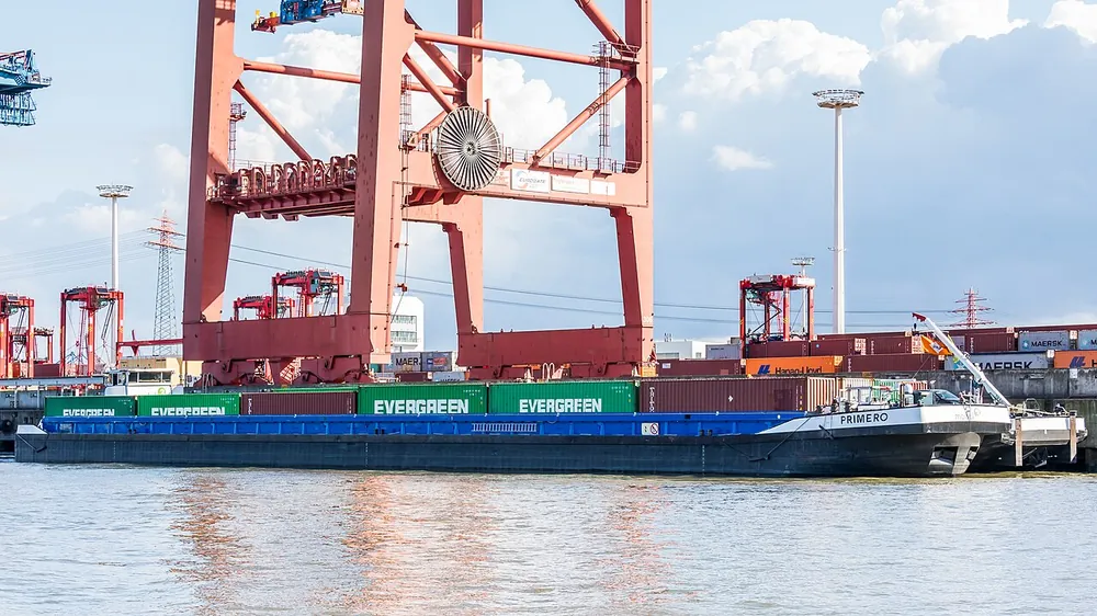 Cargo ship moored at a container terminal