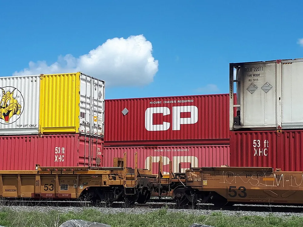 Stacked shipping containers in a container yard